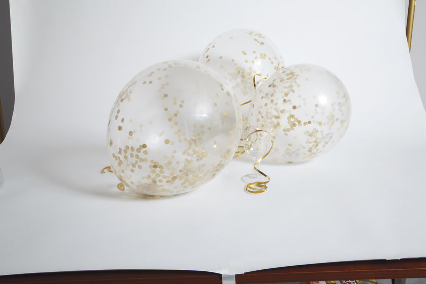 6 ballons en latex avec confettis doré à l'intérieur