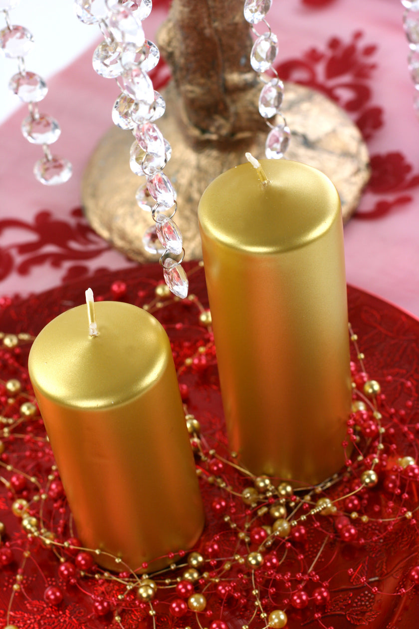 1 bougie dorée (15x6 cm)