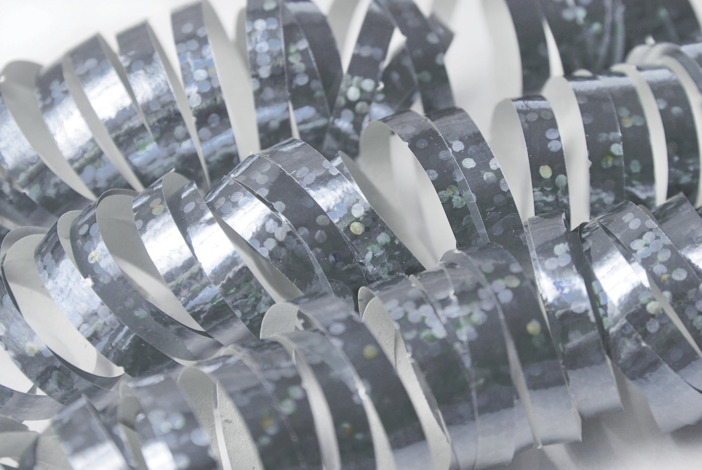 18 serpentins hologramme argent