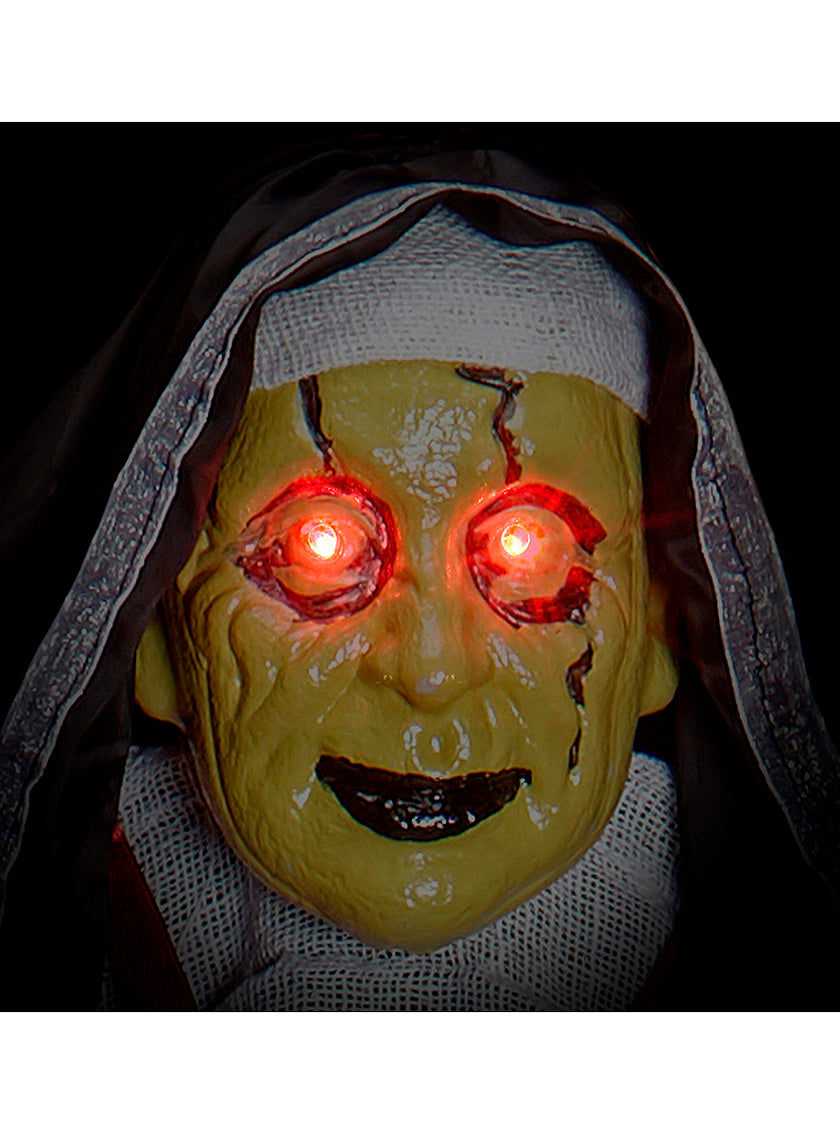 Figure suspendue squelette dans une cage