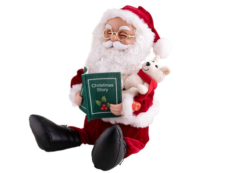 pére noël assis avec peluche et livre sonore et motorisé 35cm