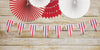 GUIRLANDE FANIONS FESTONNES ROUGE RAYE BLANC ET OR