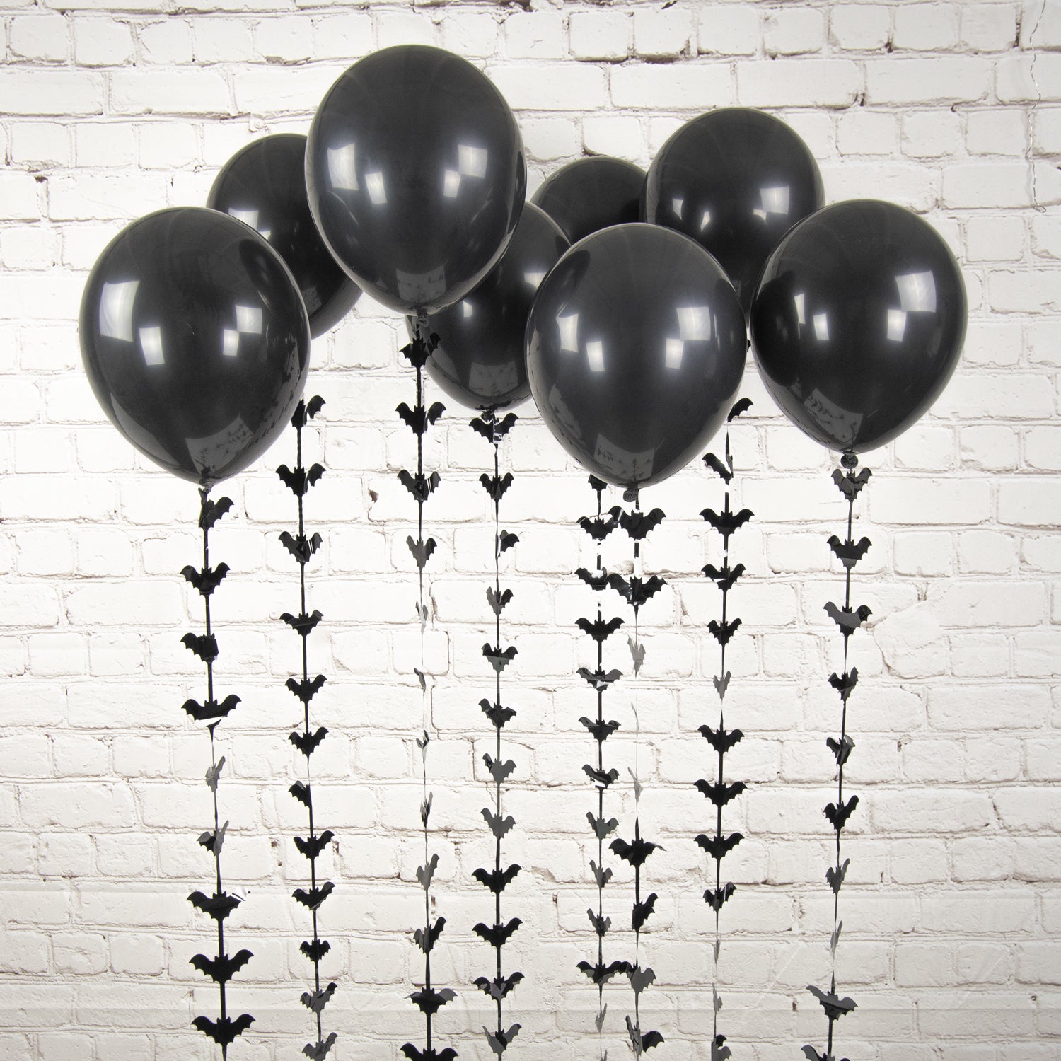 BALLONS DE BAUDRUCHE NOIRS A QUEUE CHAUVE SOURIS x 8