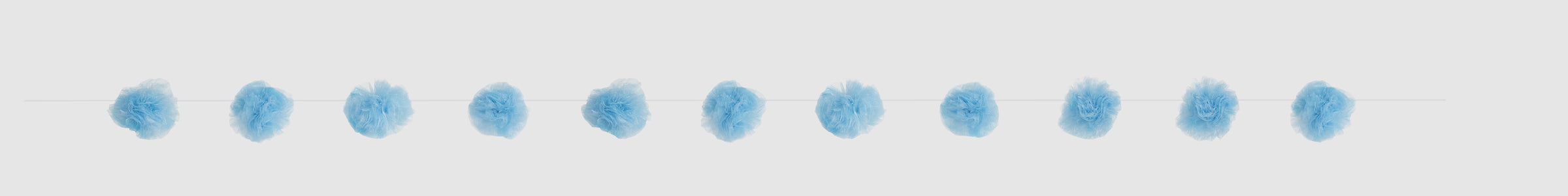 Guirlande pompons bleus - Gamme couleur unie