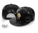 casquette snapback tête de lion imitation cuir noir